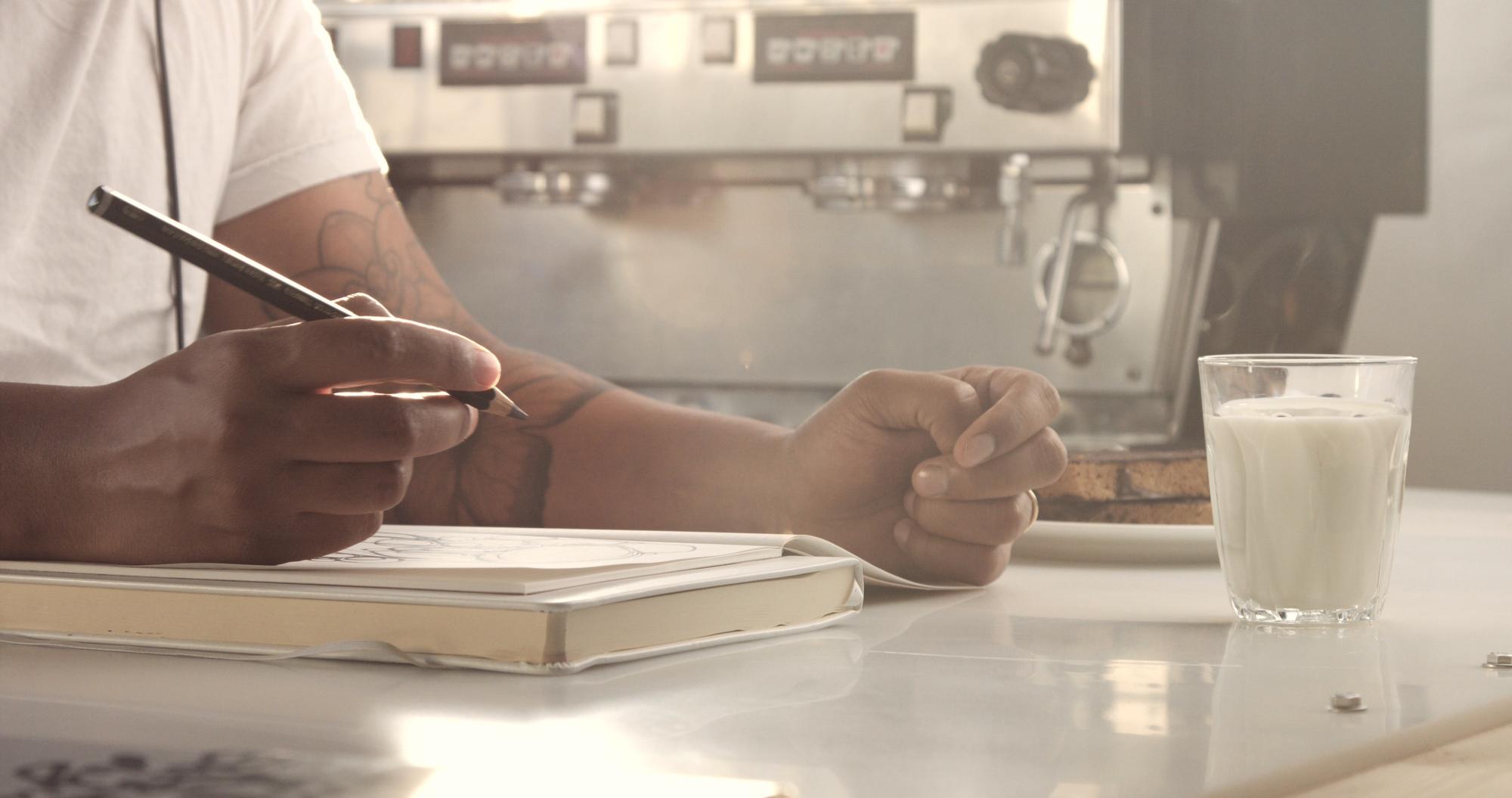 small editorial image of chef preparing menu